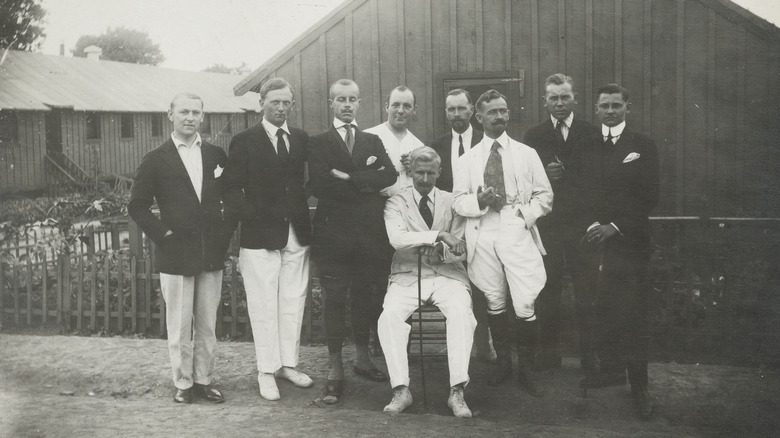 Well-dressed German POWs posing